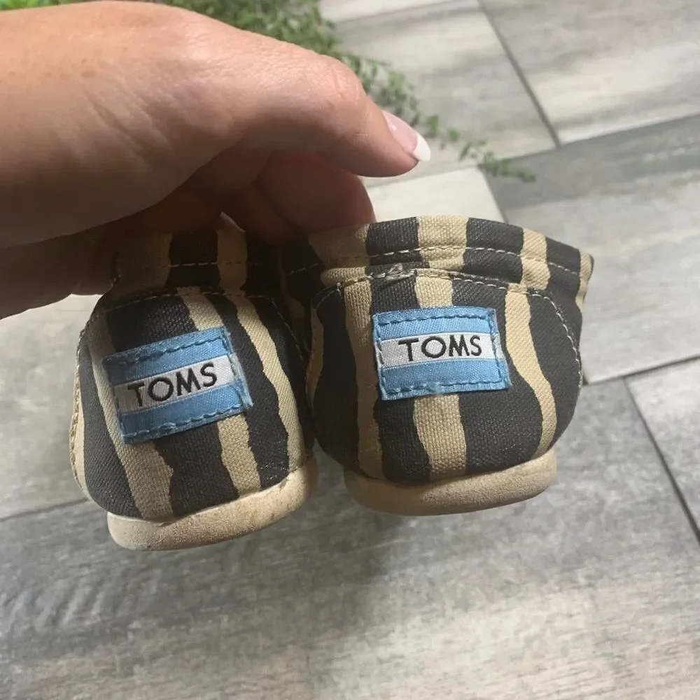 ‎{Toms} zebra print flats